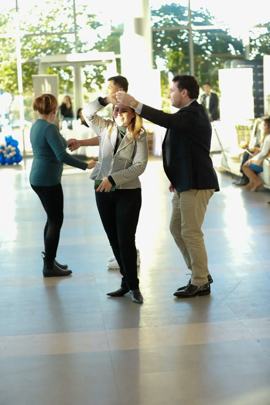 Attendees dancing during the event networking